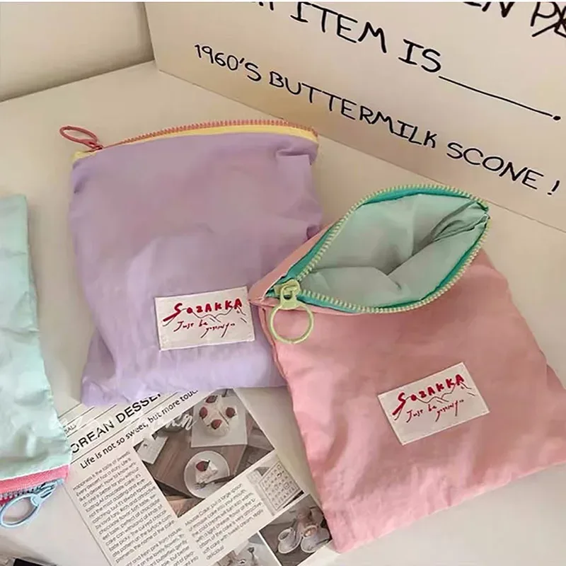 Sacs de maquillage monochromes, rouge à lèvres cosmétique simple coréen, sac de rangement pour serviettes hygiéniques, étui à crayons pour étudiants, sacs d'évaluation poudres
