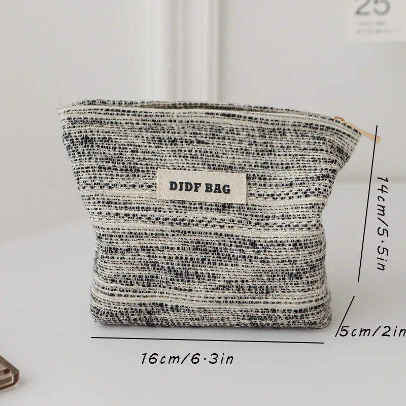 djdf – petit sac de maquillage pour femmes, ligne noir et blanc, sac de rangement de serviettes hygiéniques portables en toile avec fermeture éclair, porte-monnaie simple à main