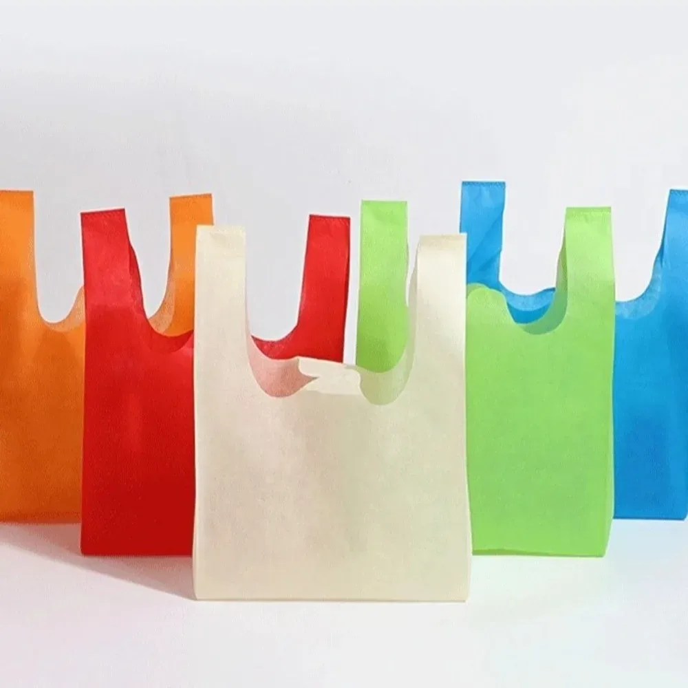 sac de courses non tissé de couleur unie, 50 pièces, sac à main portable de grande capacité écologique, sac de rangement pratique et durable pour jouets