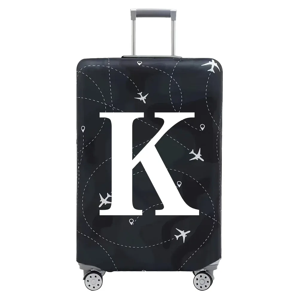 cette housse de valise extensible s'adapte aux valises de 18 à 32 pouces et présente un motif de lettres a-z blanches imprimé sur la surface.