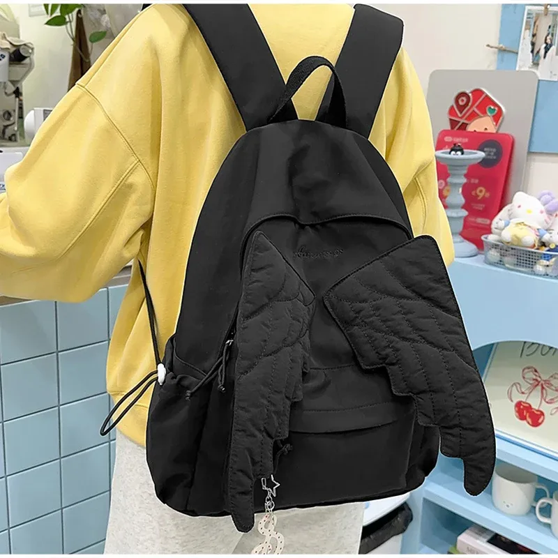sac à dos à ailes style y2k pour femmes, sac en toile d'ange mignon japonais, pompon créatif, couleur unie, sac à bandoulière de grande capacité pour étudiantes