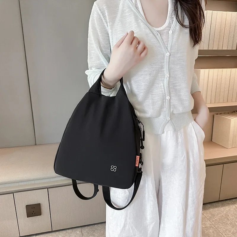 sac à dos léger et résistant à l'eau pour femme, durable, avec plusieurs poches, idéal pour les trajets quotidiens, les étudiants et les voyages