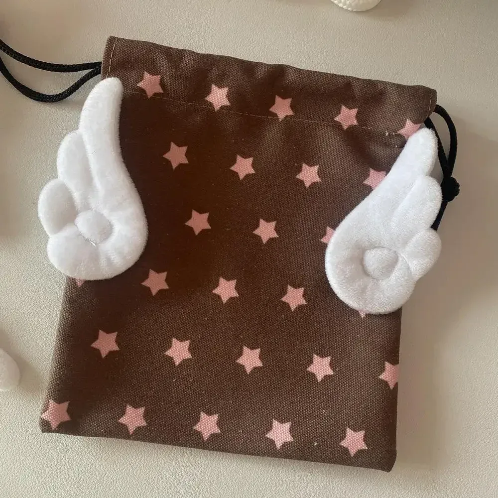 toile chaude ailes d'ange étoiles sac de maquillage ins cordon sac de rangement portable bundle poche anti-poussière sac de rangement organisateur sac