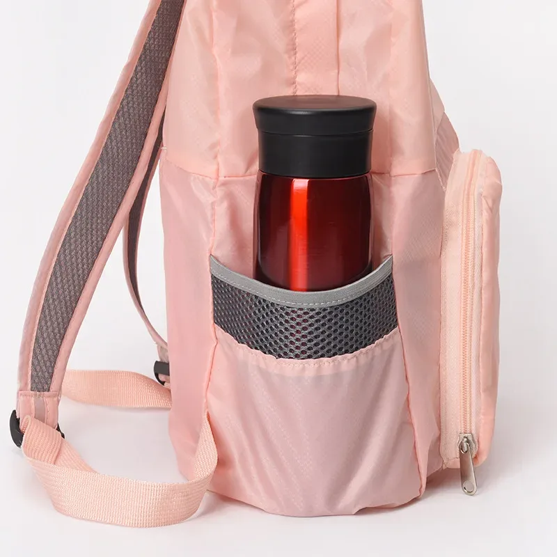 nouveau sac à dos de voyage multifonctionnel double pliable de conception avec sac d'école extérieur étanche 2025