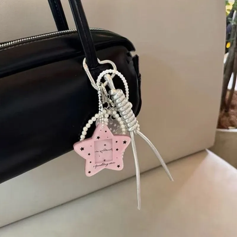porte-clés élégant en forme d'aile avec nœuds, accessoire de sac à dos pour les fans et les amateurs de mode, avec une construction stable