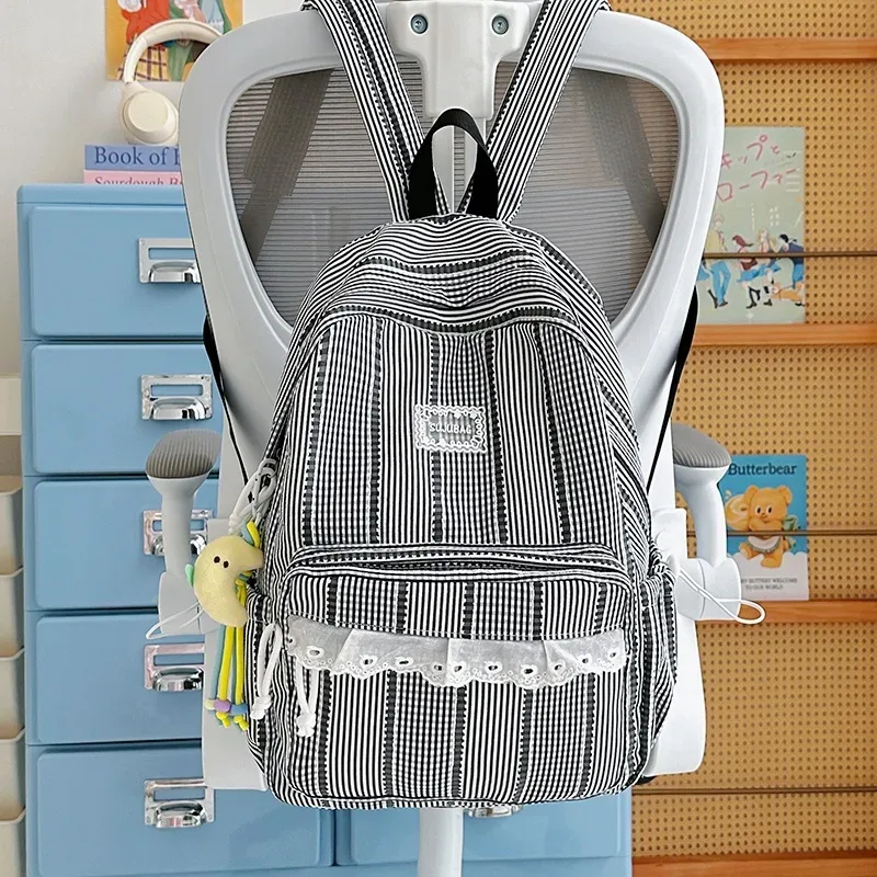 sac à dos coréen simple et esthétique en dentelle à volants, couleur unie, rayé, grande capacité, pour étudiantes, idéal pour l'école, les trajets quotidiens et les voyages