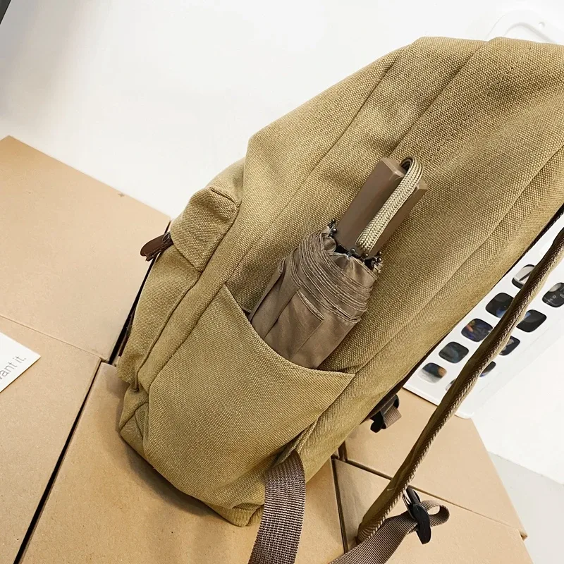 sacs à dos en toile noire unie 100% coton, sacs de loisirs ou de voyage, forfaits unisexe de grande capacité, sacs d'école simples à la mode