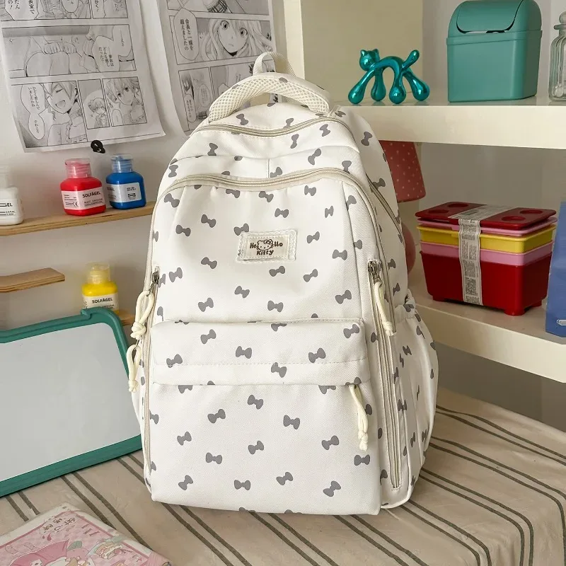 Sac à dos en nylon imprimé avec motif nœud, style preppy, léger, pour étudiantes, avec plusieurs compartiments de rangement, sac de voyage