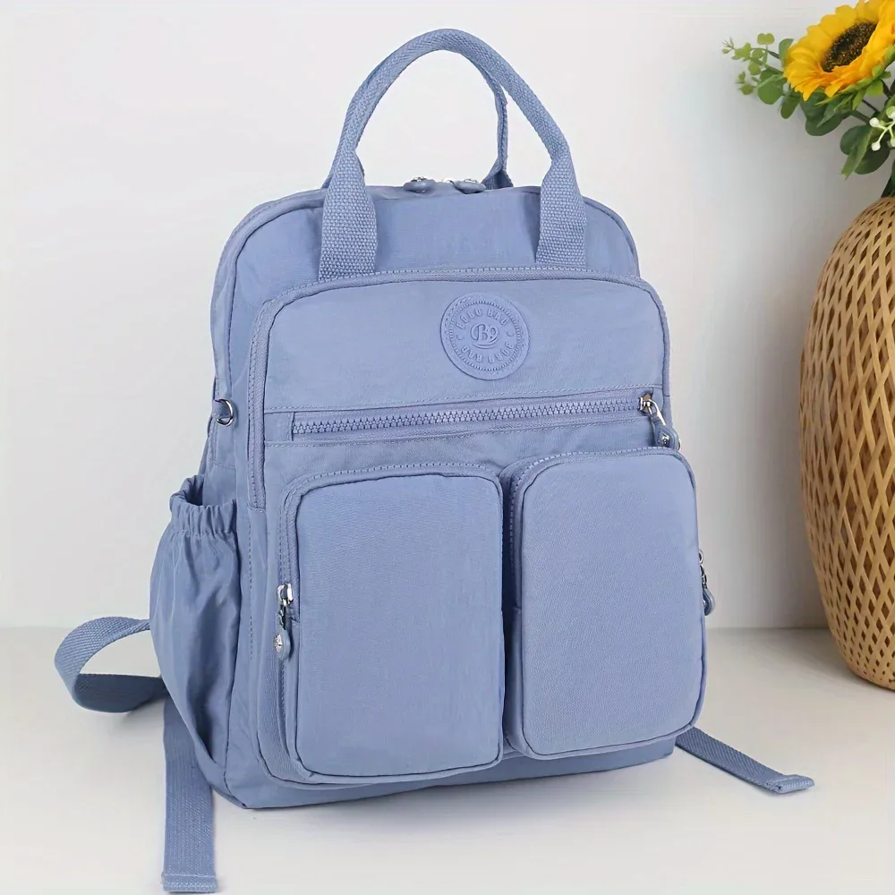 sac à dos d'école léger de grande capacité, sac de voyage multi-poches, matériau en nylon résistant à l'usure, bretelles confortables.