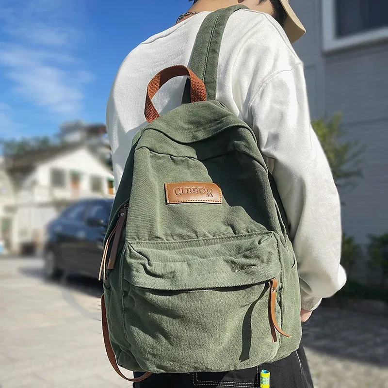 Nouveau Cool fille garçon toile vert ordinateur portable étudiant sac à la mode femmes hommes collège sac femme sac à dos mâle dame voyage sac à dos mode