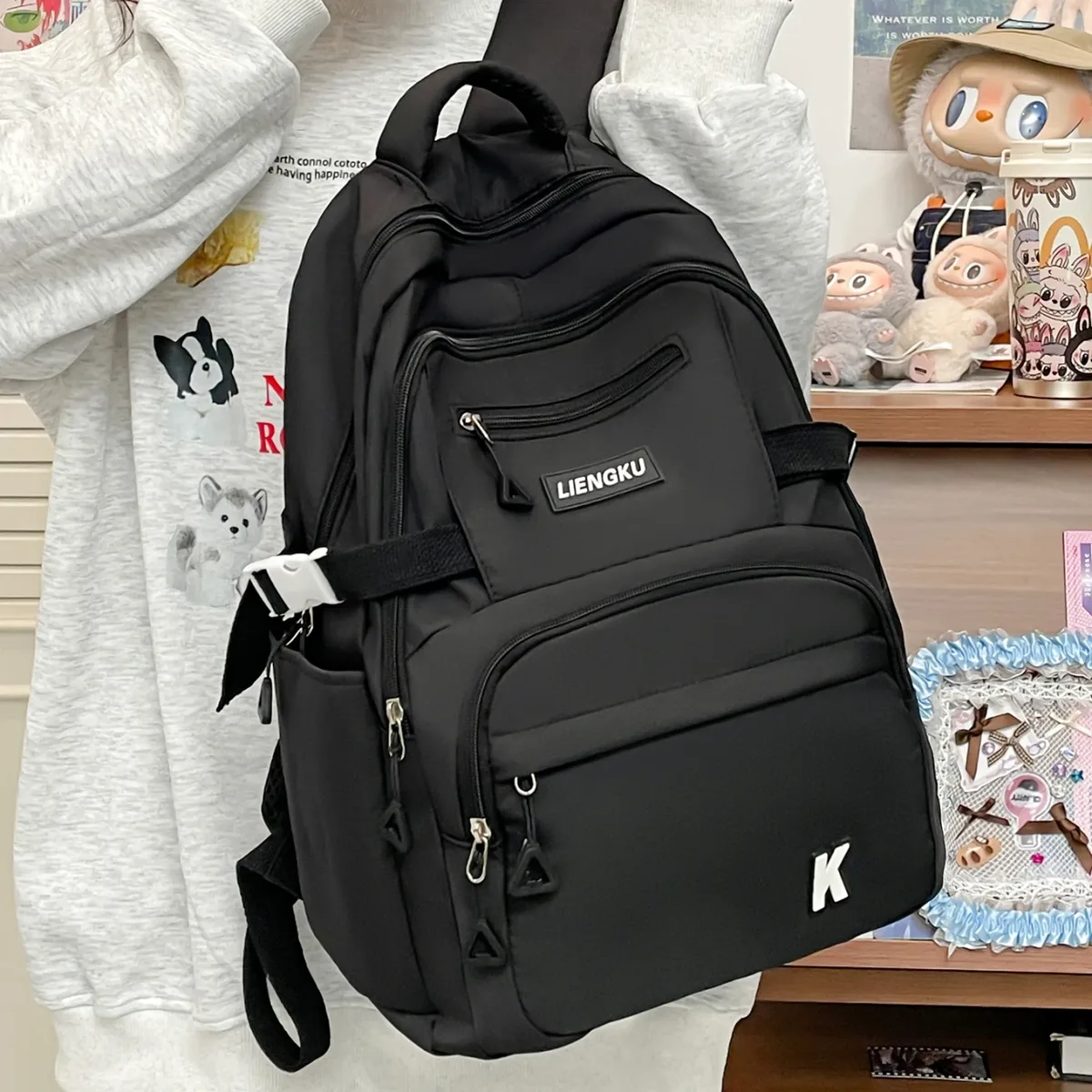 Sac à dos polyvalent de couleur unie pour étudiants, sac à dos léger en nylon de grande capacité pour ordinateur, sac de voyage pour l'école et les déplacements