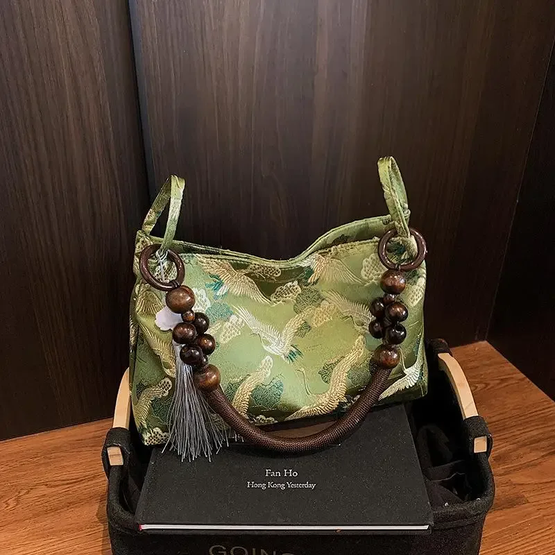 hasp fil à coudre brodé style national sacs à bandoulière gland décoration 2025 printemps nouvelle offre spéciale sacs à main pour femmes