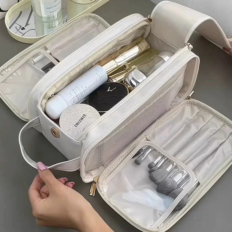 sac de maquillage multifonctionnel pour femmes, grande capacité, portable, haut de gamme pour les voyages, sac de rangement pour pinceaux de maquillage et articles de toilette.
