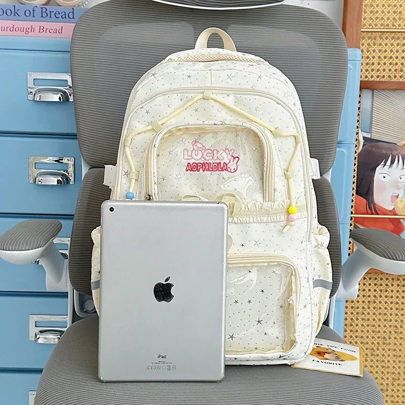 sac à dos pour femmes, sac de voyage multi-poches, joli sac d'école à rayures réfléchissantes avec nœud et étoiles pour adolescentes, sac à livres