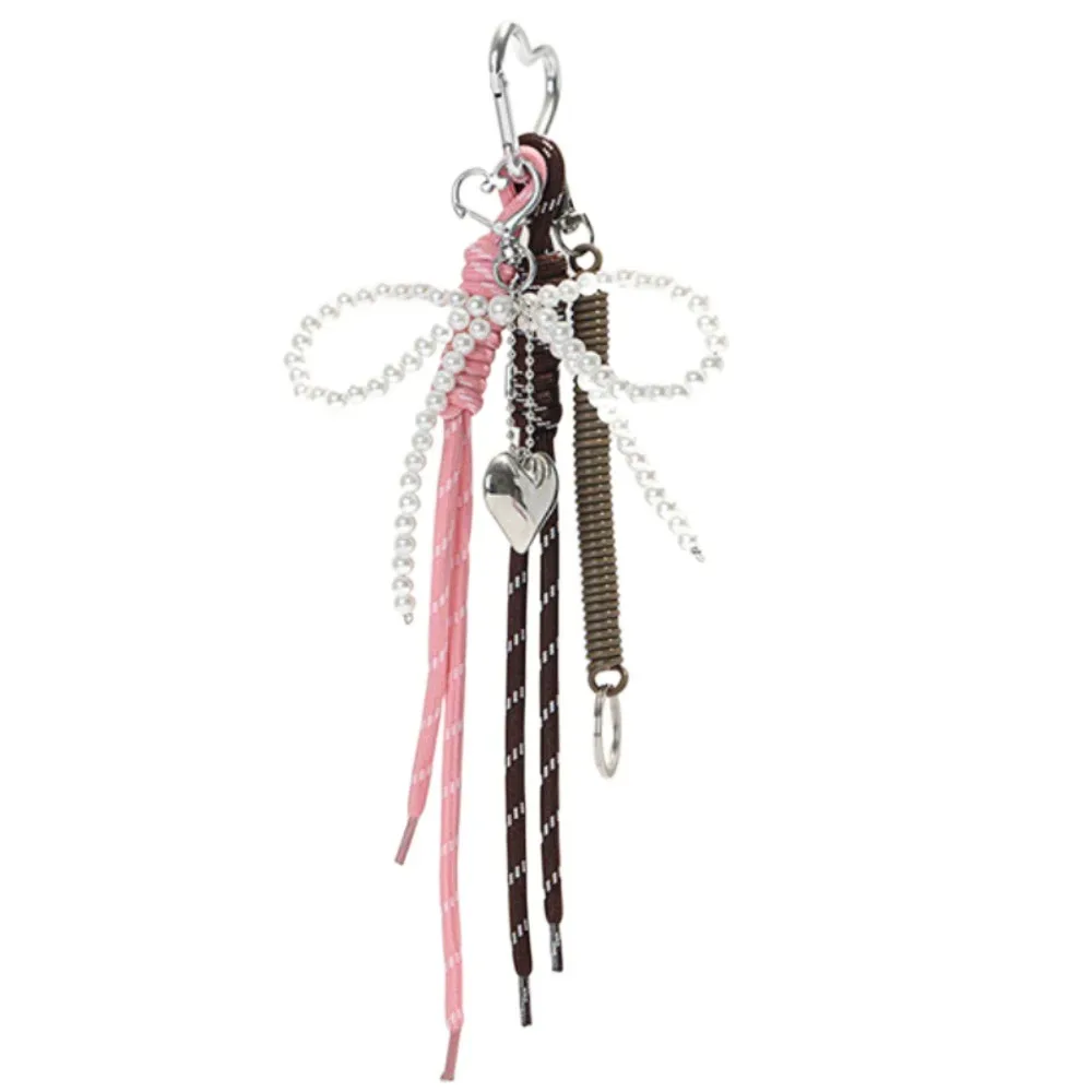 porte-clés créatif en cuir brillant avec nœud perlé, longue pampille, cœur d'amour, pendentif pour sac à dos, breloque de sac faite à la main, décoration pour sac à main quotidienne