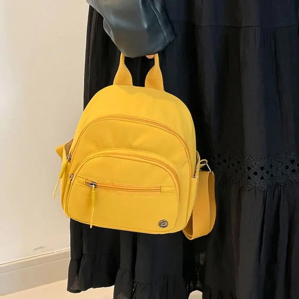 Sac à dos portable pour femme en nylon, léger, imperméable, multipoches, décontracté, avec poignée, tendance