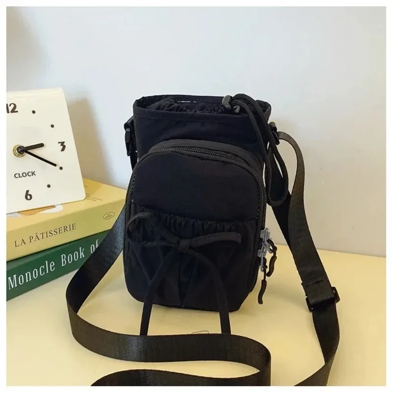 nouveau sac bandoulière léger pour téléphone portable pour femme, sac de sport extérieur, sac de cyclisme, porte-bouteille d'eau, sac de voyage, design à nœuds
