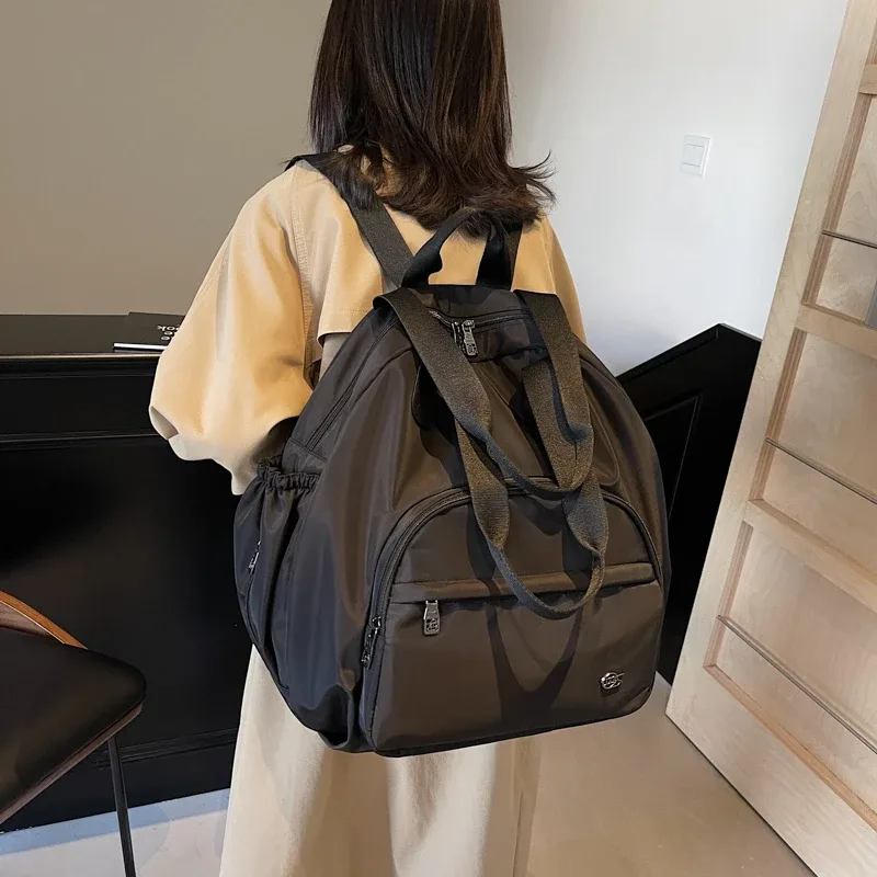 sac à dos de voyage en nylon pour femmes, sac à bandoulière multifonctionnel, style jeune et dynamique, sac d'école pour femmes