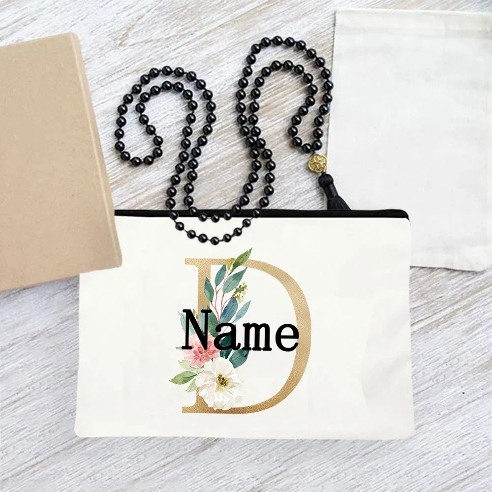 pochette en toile personnalisée avec initiales florales dorées, trousse de toilette légère personnalisée avec monogramme pour femmes, idéale pour les voyages quotidiens.