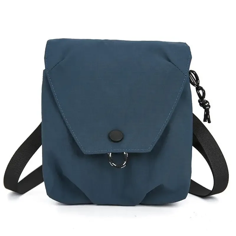 1 sac à bandoulière portable unisexe en tissu nylon imperméable, sac à bandoulière décontracté pour téléphone, idéal pour les voyages.