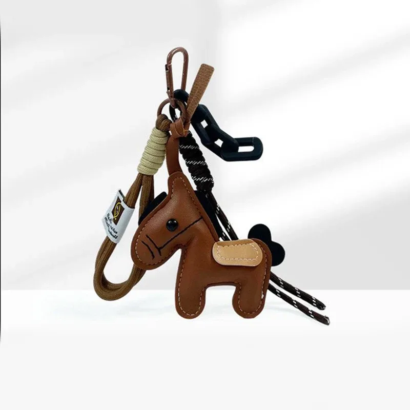 porte-clés en corde tressée avec pendentif en cuir motif cheval, accessoire de mode pour sacs à main, sacs à dos et décoration de clés de voiture