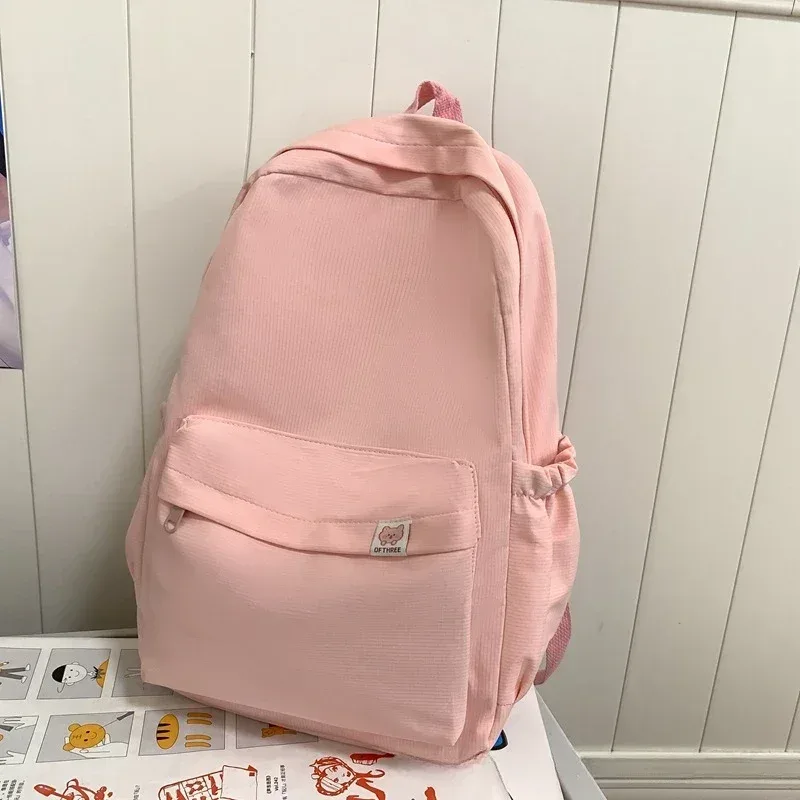 nouveau sac à dos imperméable en nylon pour femmes sac de voyage pour femmes sacs à dos cartable pour adolescentes couleur unie bookbag mochila bookbag