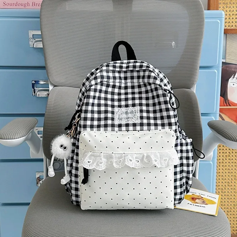 sac à dos décontracté à carreaux de grande capacité pour l'école, les voyages, les activités de plein air et l'usage quotidien, adapté aux élèves du collège et du lycée et aux étudiants.