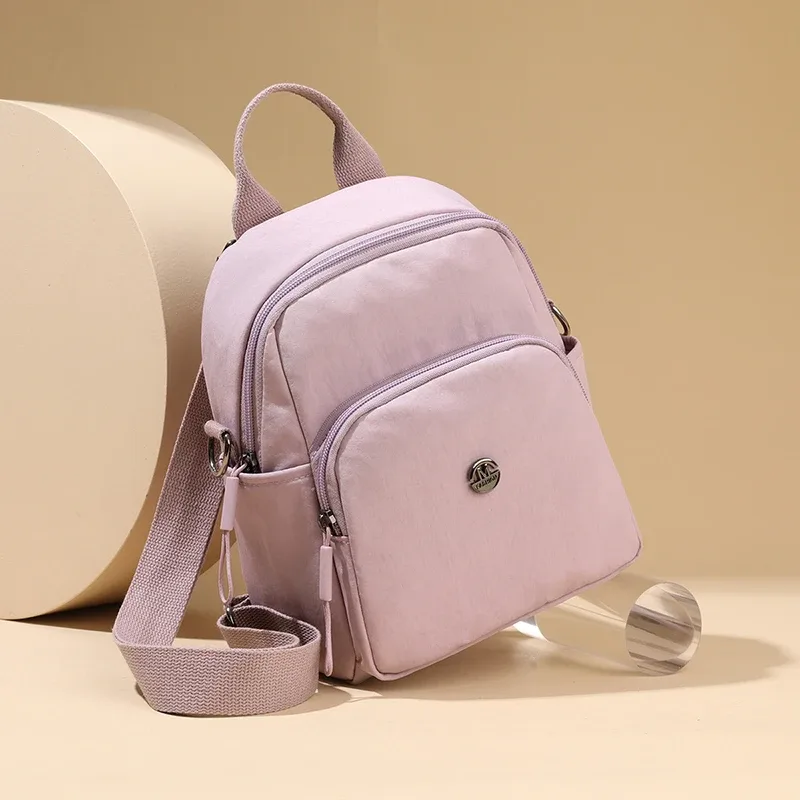 petit sac à dos léger de voyage décontracté pour femmes, sac à bandoulière en tissu imperméable de grande capacité et sensation haut de gamme pour filles, nouvelle collection