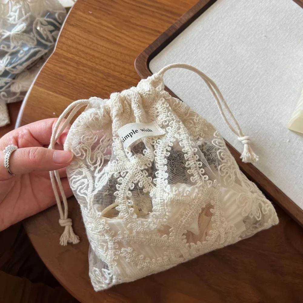 sacs de rangement cosmétiques vintage en dentelle blanche brodée, étuis en coton à motif floral ajouré avec cordon de serrage, pochette de rangement pour maquillage