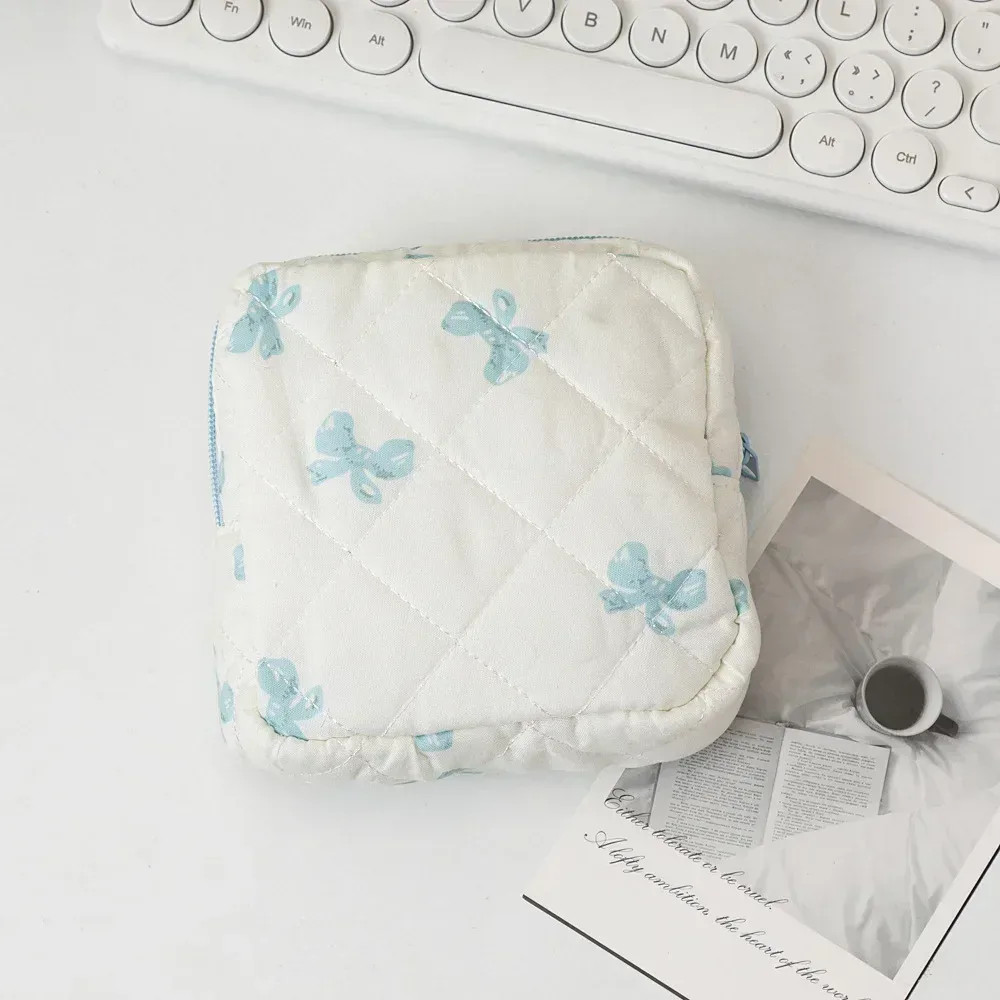 mini sac à cosmétiques avec nœud mignon pour femmes, sac de rangement pour serviettes hygiéniques, porte-tampon portable, mini sac de rangement pour maquillage et rouge à lèvres
