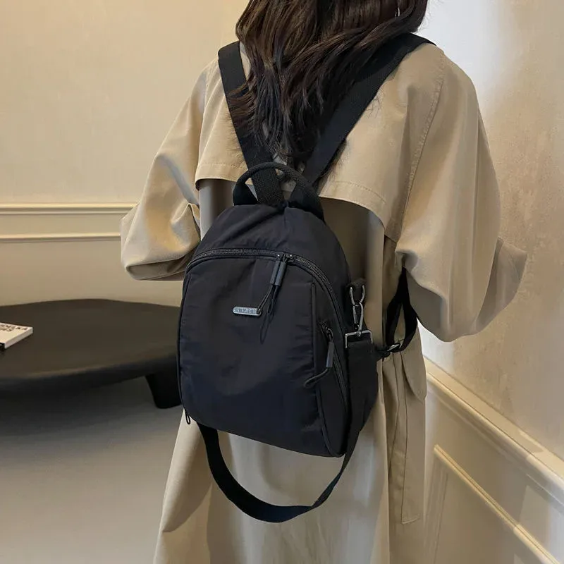 mini sac à dos multifonctionnel en nylon, sac de voyage convertible décontracté à bandoulière pour femme, sac à dos quotidien multi-poches pour l'extérieur