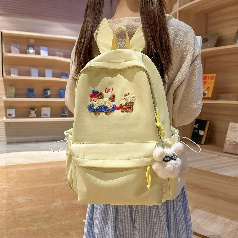 nouveau sac à dos léger et tendance pour étudiante, style campus polyvalent, broderie fille mignonne, idéal pour les trajets quotidien et l'école