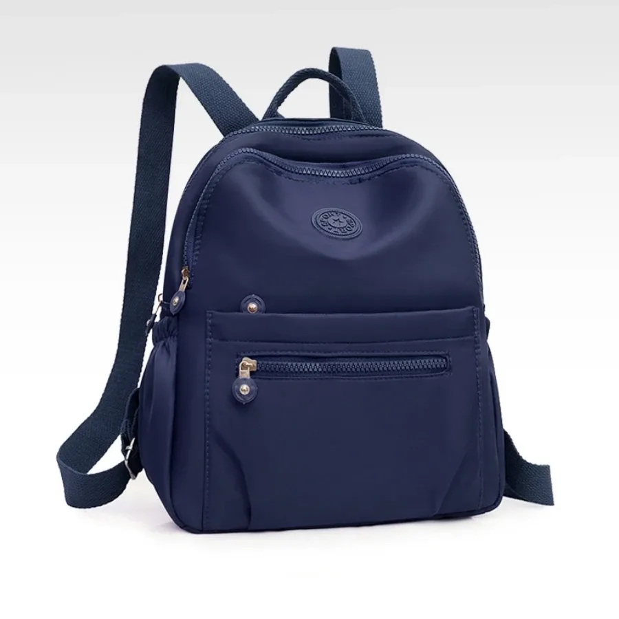 sac à dos en nylon de couleur unie, sac d'école de voyage léger, sac à dos de mode pour le travail, sac de voyage peut être accroché dans les bagages