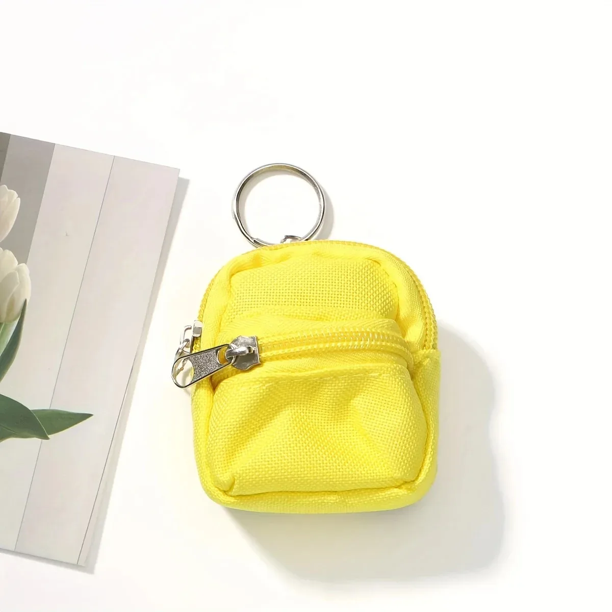 mini sac à dos porte-monnaie porte-clés avec deux poches zippées, pochette de rangement fonctionnelle pour petits essentiels, joli accessoire de sac pour le quotidien