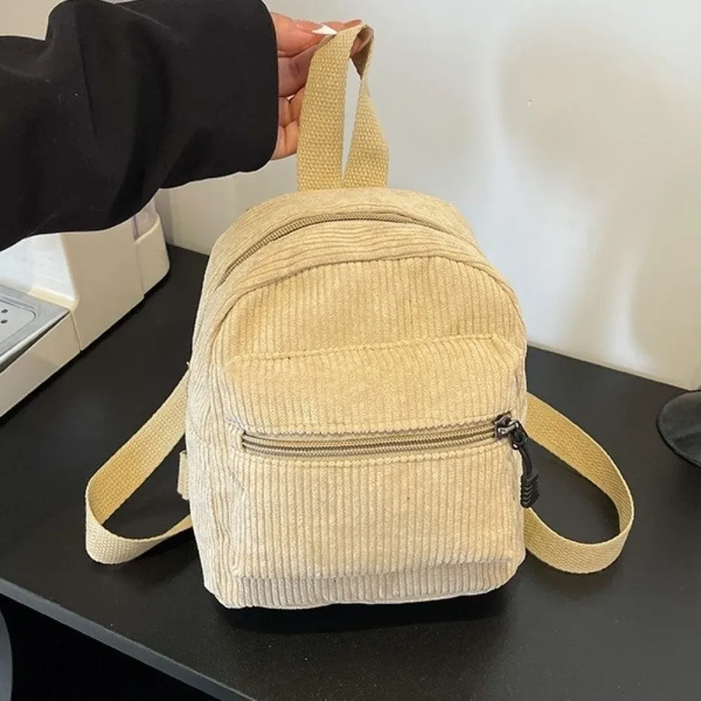 mini sac à dos en velours côtelé de couleur unie, style coréen, avec fermeture éclair, multi-poches, double bandoulière, sac à dos portable vintage pour le collège