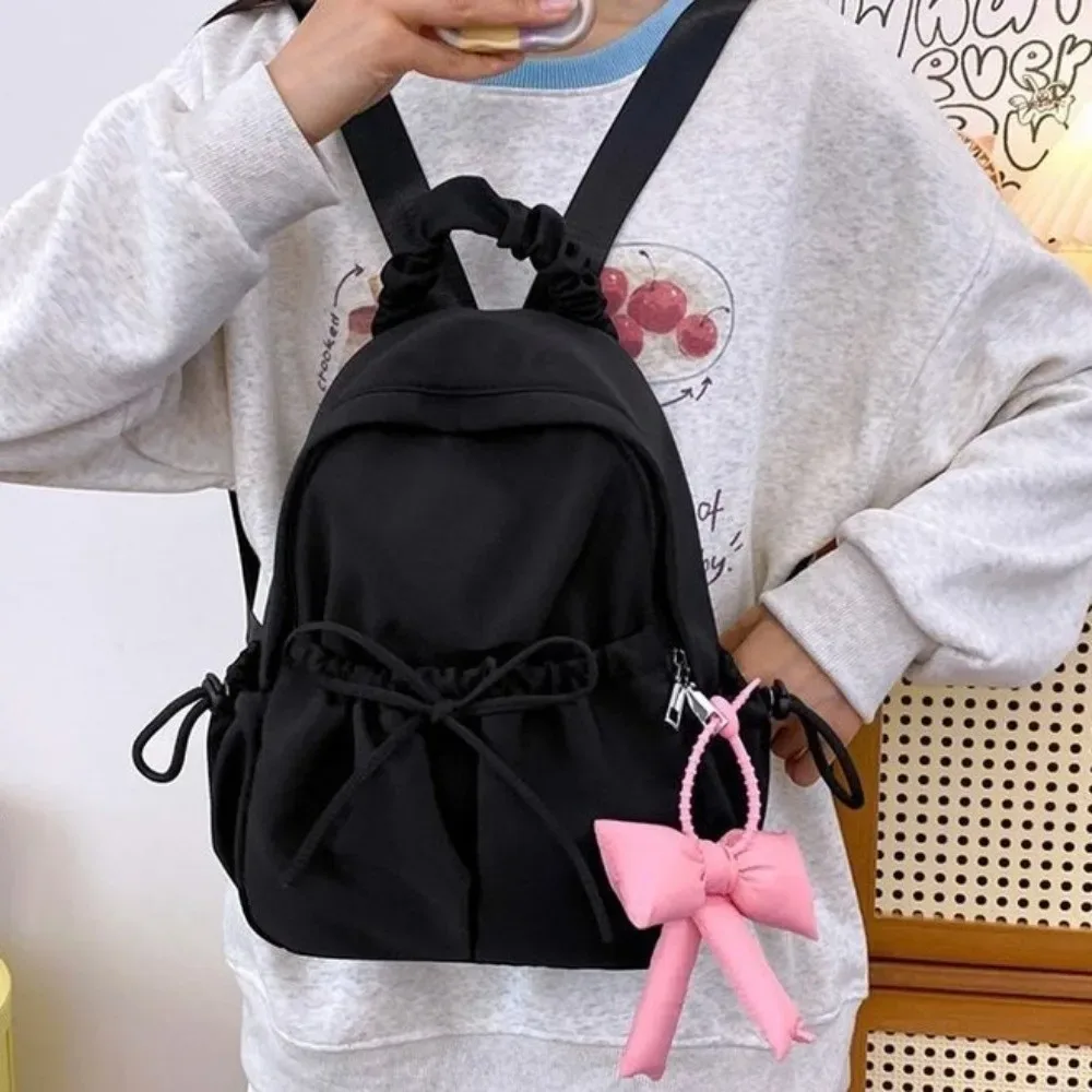 sac à dos à cordon en nylon pour étudiants, grande capacité, design plissé, sac de voyage, bretelles réglables et souples, sac à dos avec nœud.