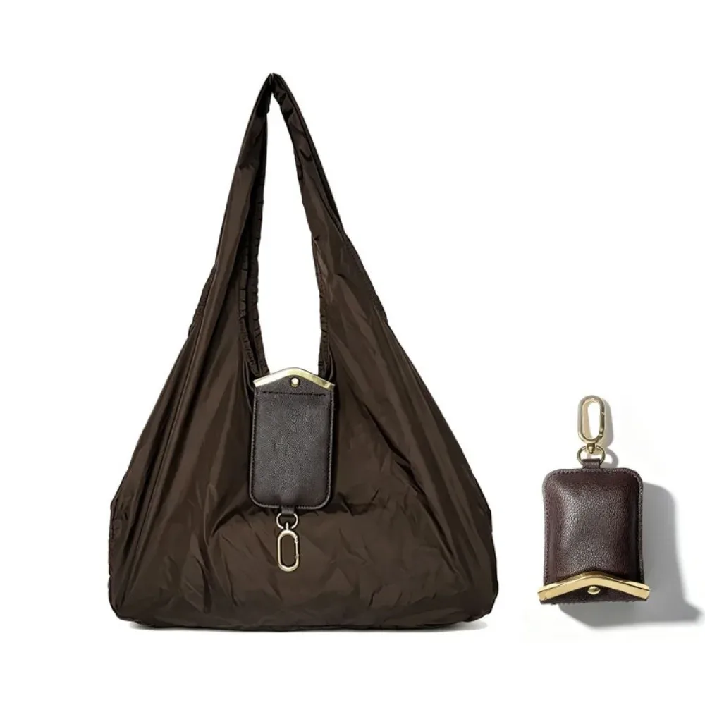 sac fourre-tout porte-clés couleur unie, mini sac de shopping pliable résistant aux déchirures, ultra-léger et peu encombrant, pochette 2-en-1 avec breloque.