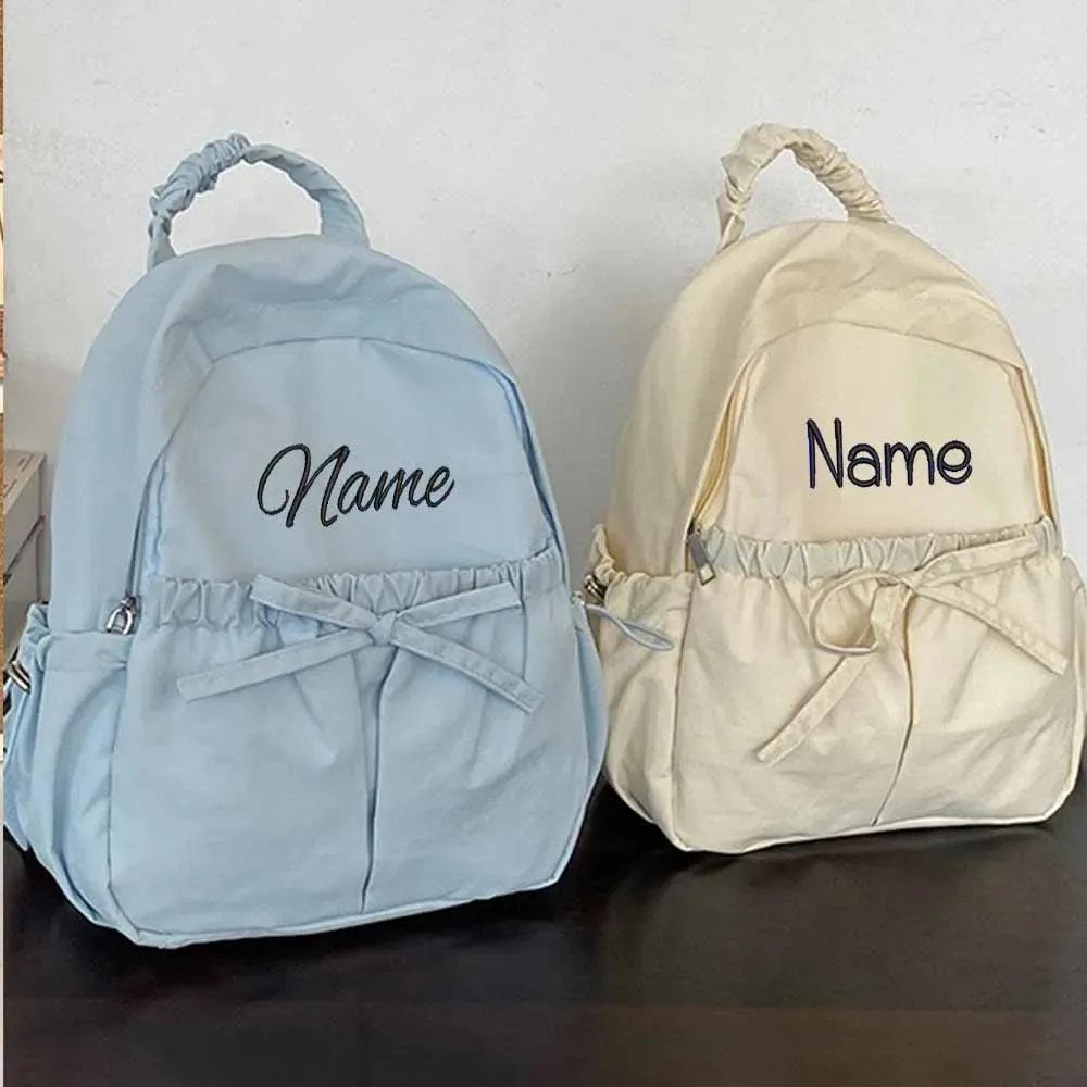 Version coréenne design de niche nouveau sac à dos en nylon brodé, sac à dos léger polyvalent personnalisé de grande capacité