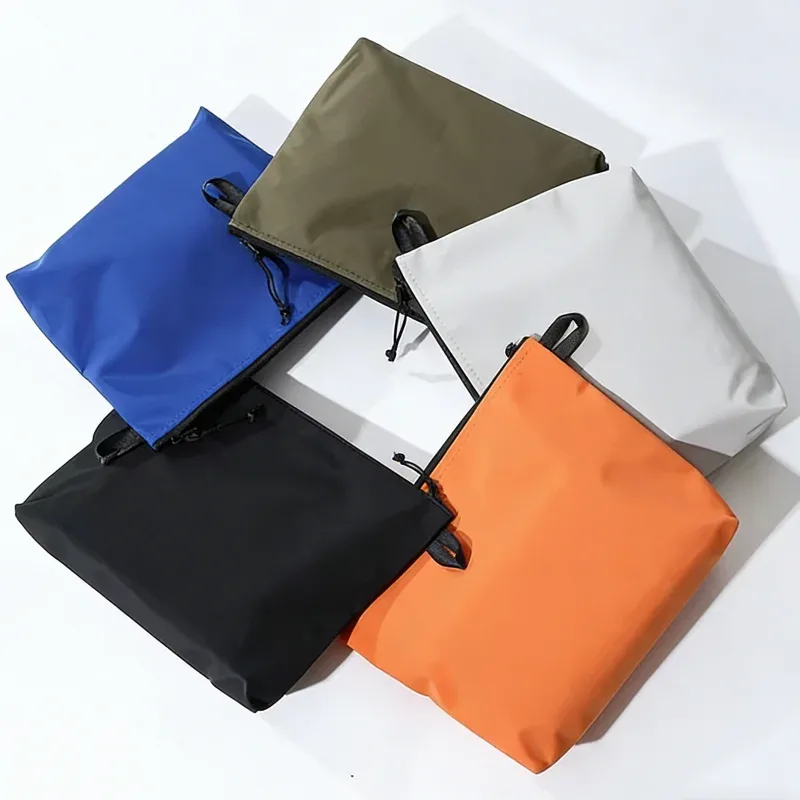 Sac de maquillage étanche à fermeture éclair, sac de voyage en tissu Oxford, sac de rinçage portable, sac de voyage pliable, article essentiel pour les voyages en plein air
