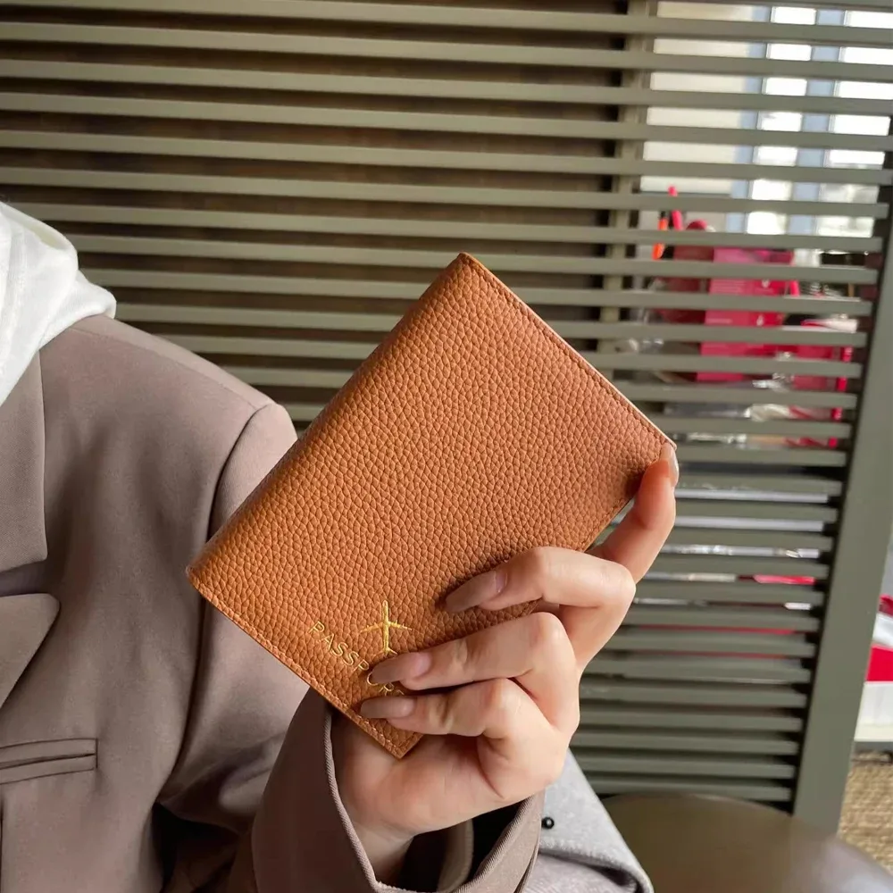 porte-passeport en cuir de galets véritables, étui de protection de passeport de voyage, portefeuille de créateur de luxe