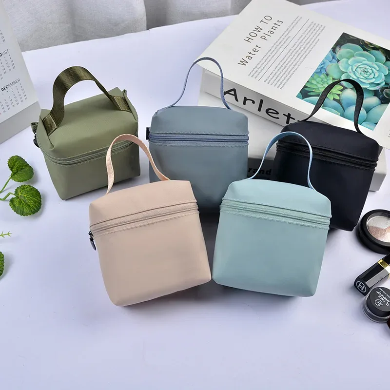Sac de maquillage à poignée étanche Portable haut de gamme, sac de rangement de rouge à lèvres, pochette pour écouteurs, Mini sac pour serviettes menstruelles, meilleure vente
