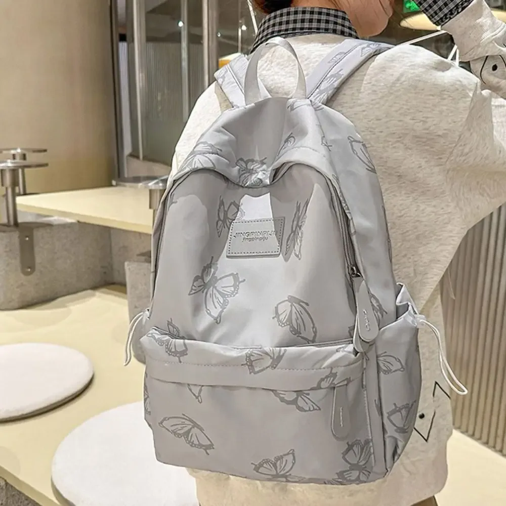 petit sac à dos papillon simple style coréen, couleur unie, avec fermeture éclair, sac à bandoulière, plusieurs poches, sac à dos sport décontracté, voyage