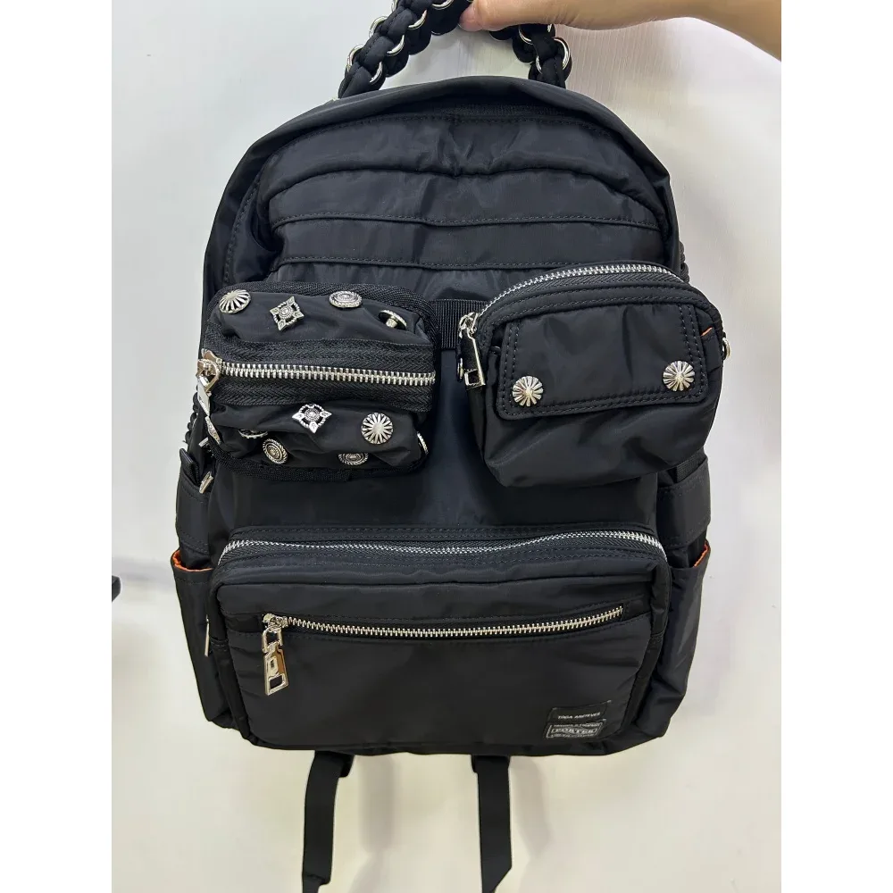 Sac à dos unisexe en nylon à rivets Porter Fashion, grand volume de rangement, portable, style urbain, pour les trajets quotidiens, le camping et les activités de plein air.
