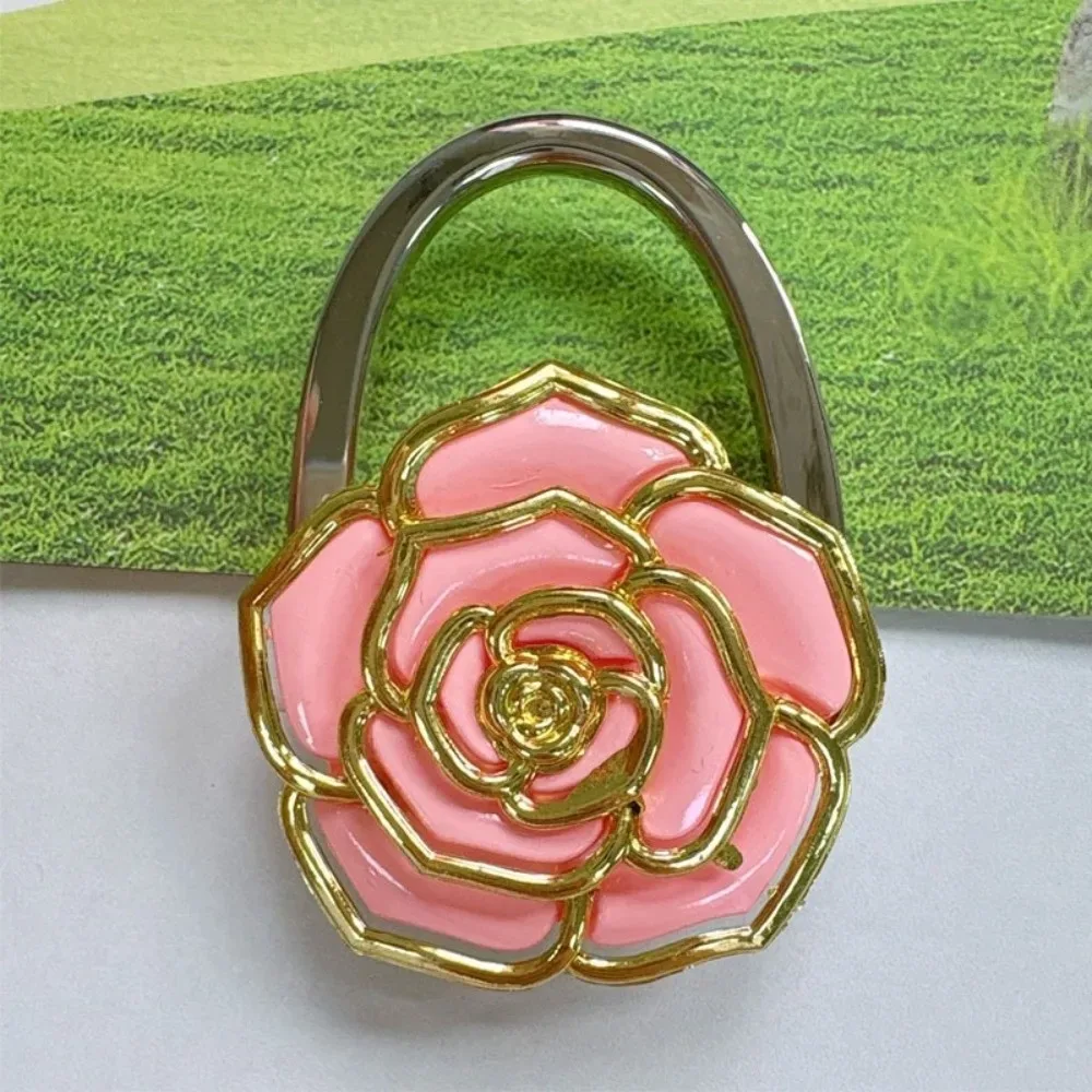 joli crochet pliable pour sac à main en forme de rose, support portable créatif pour porte-documents, support de table durable à bords dorés