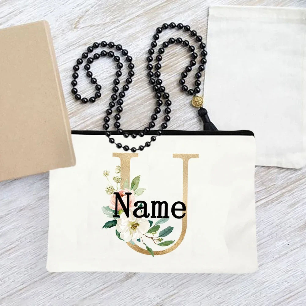 pochette en toile personnalisée avec initiales florales dorées, trousse de toilette légère personnalisée avec monogramme pour femmes, idéale pour les voyages quotidiens.