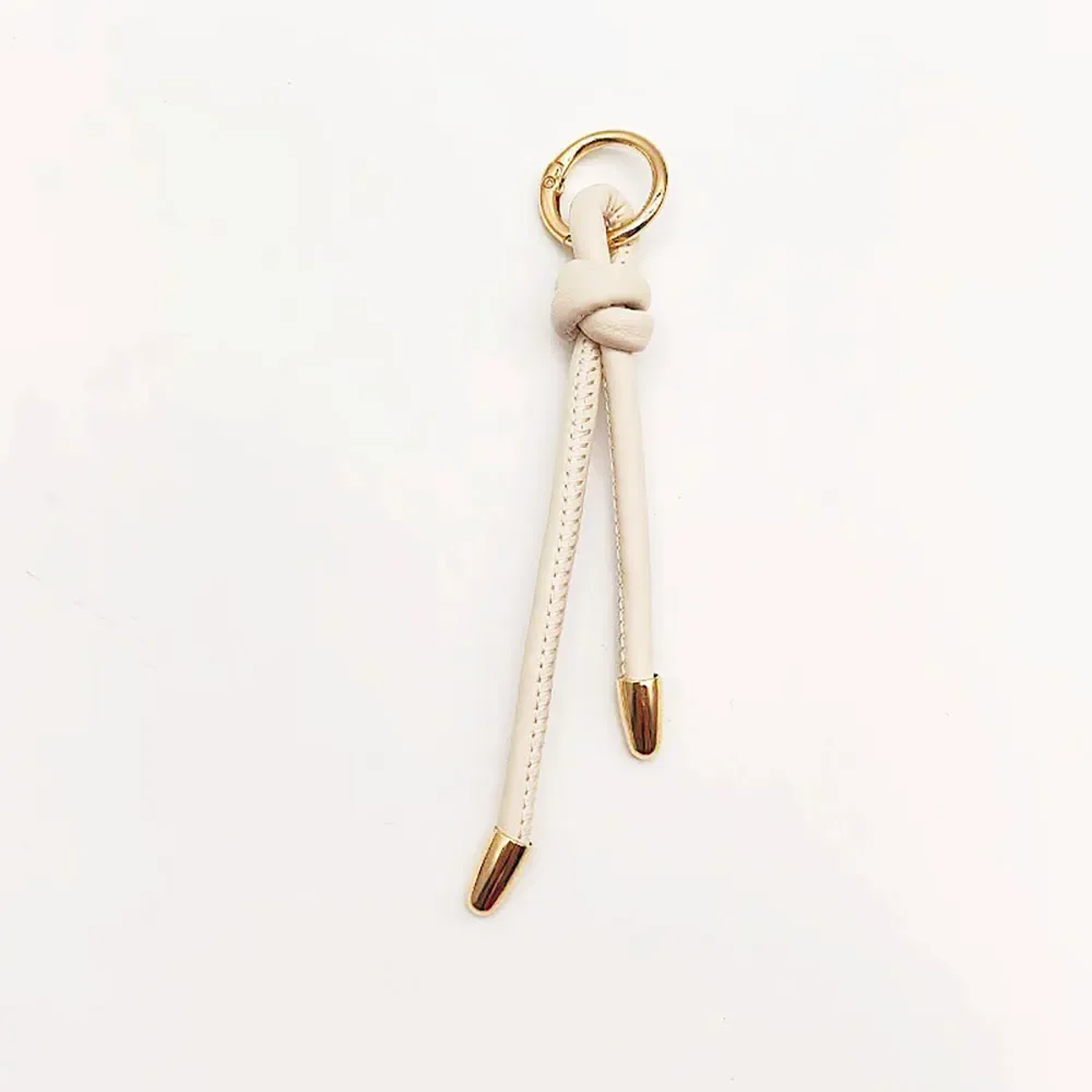 1 pièce de nouveau porte-clés pendentif, accessoires diy pour vêtements et bagages, accessoires de valise, cordon en cuir pour couple, simple et créatif.