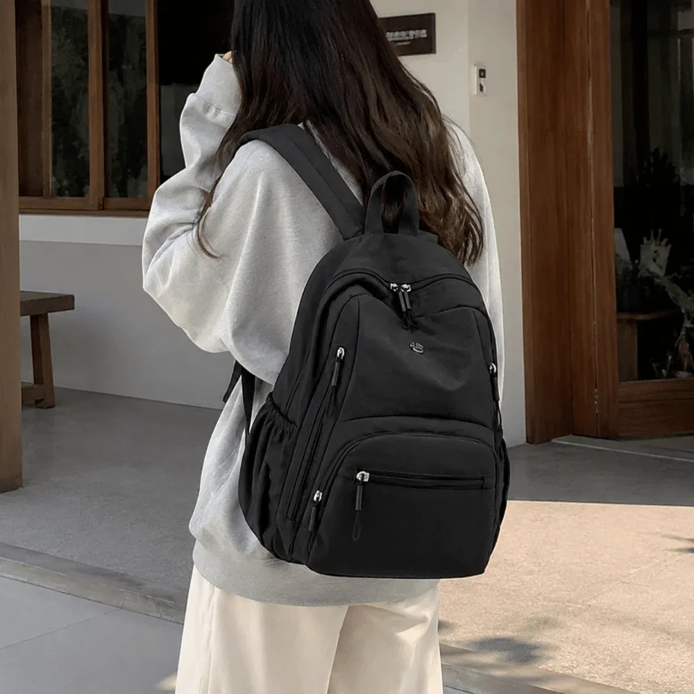sac à dos scolaire tendance en nylon grande capacité, léger et durable, sac de voyage imperméable de couleur unie pour ordinateur portable, idéal pour le camping