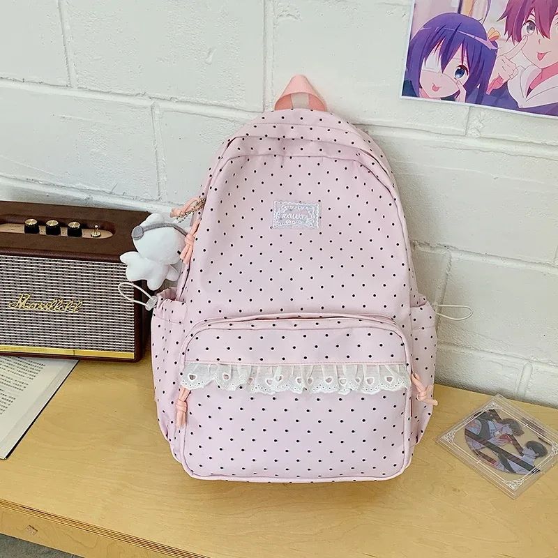 sac à dos tendance, sac d'école pour femmes à pois avec bordure en dentelle, mignon et élégant, sac à dos léger et de grande capacité pour étudiantes coréennes.