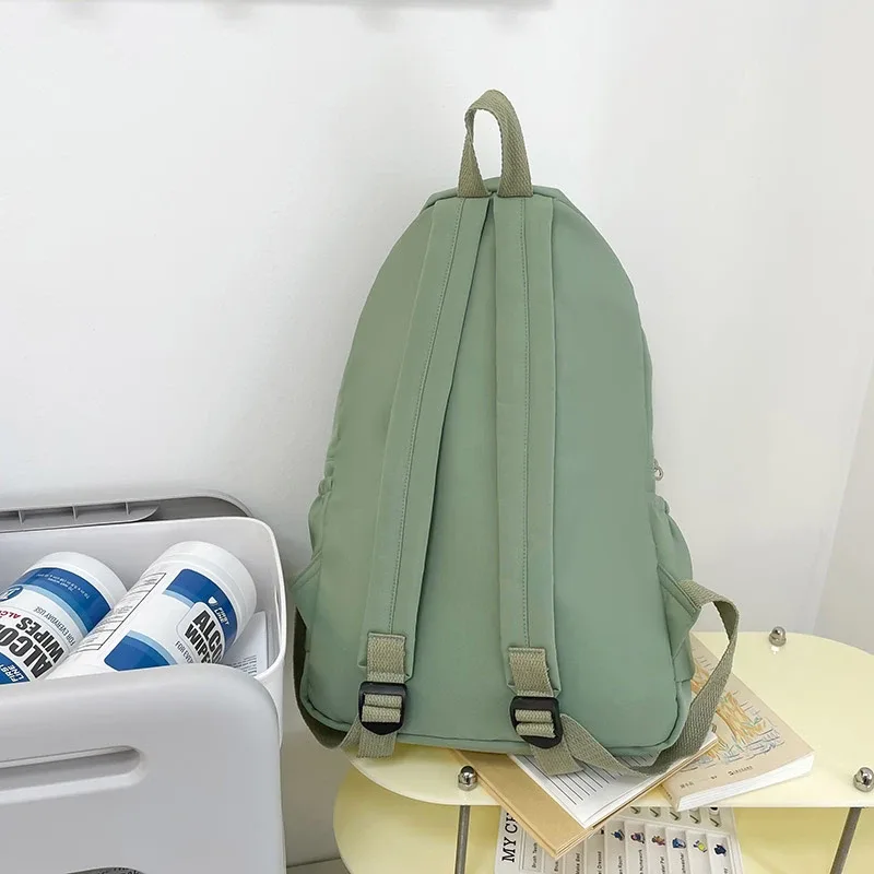 sac à dos décontracté simple de couleur unie, léger et pour lycéen, sac à dos multifonctionnel adapté aux voyages et à l'école