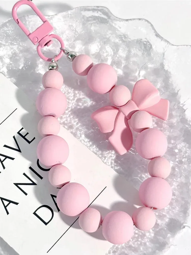 porte-clés avec nœud en perles roses, chaîne pour téléphone portable, sac pour écouteurs, corde anti-perte, porte-clés de voiture, pendentif perlé, accès au pendentif pour sac à dos